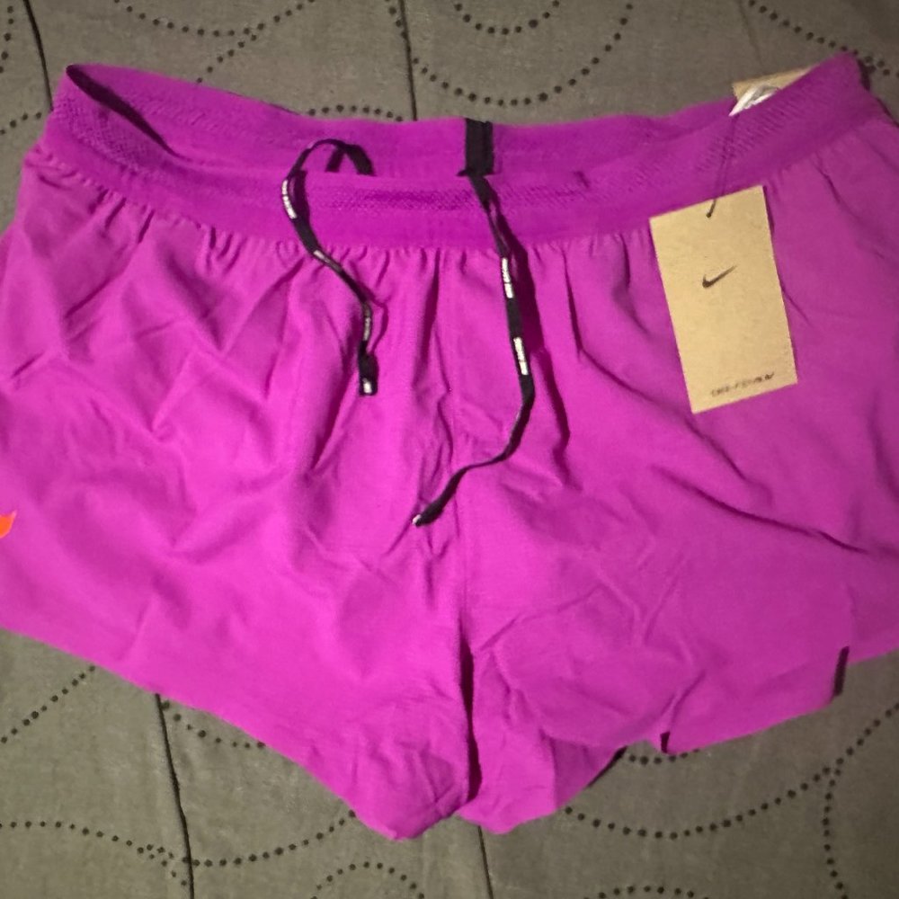 NIKE RUNNING COMPARE WITH AEROSWIFT DRI FIT ADV SHORTS SIZE 2XL OR XL MEN $80.00